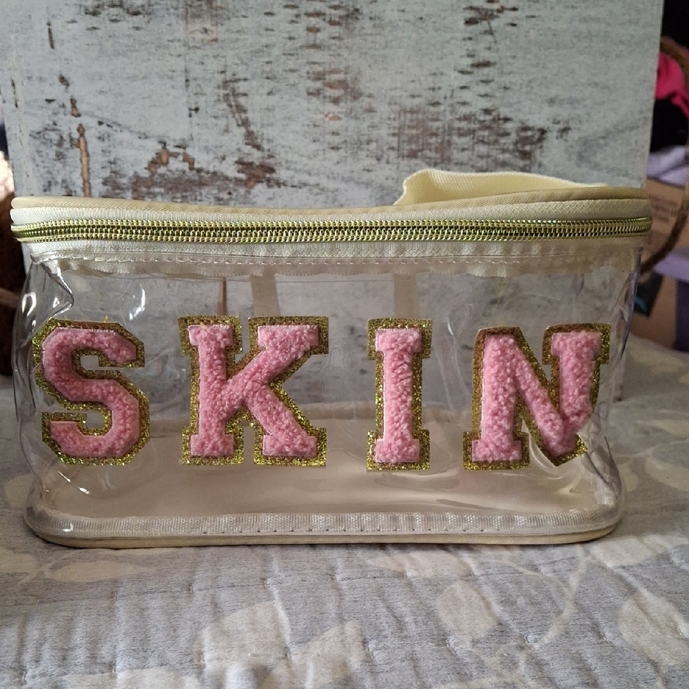 Transparent Storage Bag with Pink and Gold Details